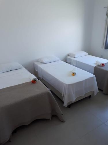 Postel nebo postele na pokoji v ubytování Pousada e Casas João e Ana
