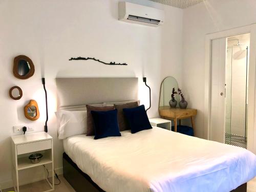 Cama o camas de una habitación en Apartamentos Real Suites Realejo
