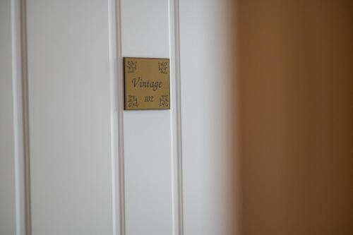 a door with a danger sign on it at Boutique Hotel Anagennisis in Pýrgos