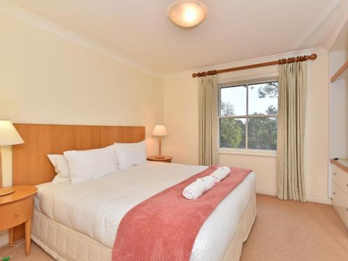 Posteľ alebo postele v izbe v ubytovaní Villa 2br Prosecco Villa located within Cypress Lakes Resort