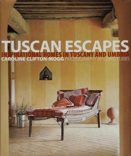 a living room with a couch in a room at Lavacchio 10 by Salogi Villas in Montalcino
