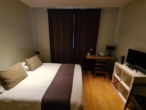 Postel nebo postele na pokoji v ubytování B&B A Côté du Cinquantenaire