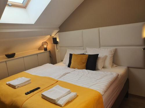 Postel nebo postele na pokoji v ubytování Kaposvár Apartman