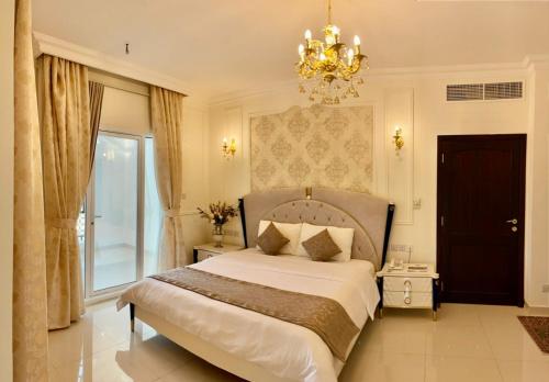 Postel nebo postele na pokoji v ubytování A'Sinamar Hotel Apartment