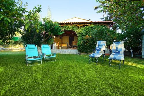 Κήπος έξω από το Edem Seaside Villa