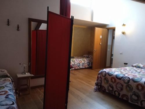 Ένα ή περισσότερα κρεβάτια σε δωμάτιο στο B&B Eden
