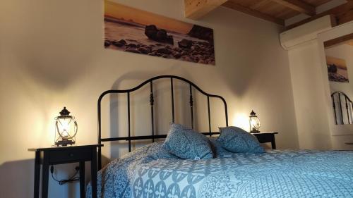 Ένα ή περισσότερα κρεβάτια σε δωμάτιο στο Casa Resineiro com Garagem e Terraço