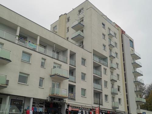 an apartment building with balconies on the side of it at Apartament Reymonta z widokiem na morze in Kołobrzeg