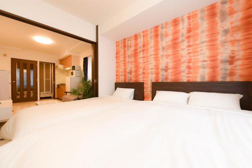 מיטה או מיטות בחדר ב-Northwest IR Room 201 - Vacation STAY 8477