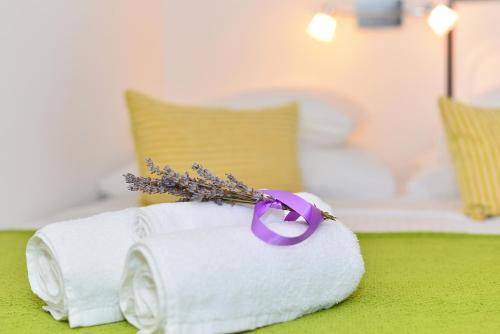 Ένα ή περισσότερα κρεβάτια σε δωμάτιο στο Apartments and Rooms Kampanel