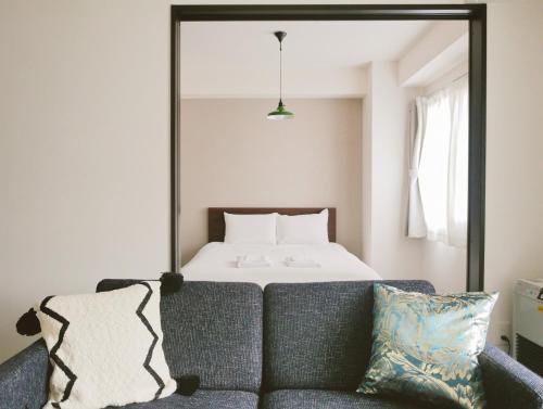 Posteľ alebo postele v izbe v ubytovaní Suncourt Hondori Garden Hills / Vacation STAY 7584