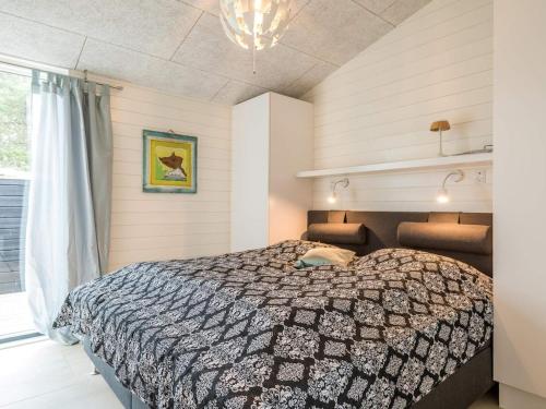 Кровать или кровати в номере Holiday home Fanø CXCIII