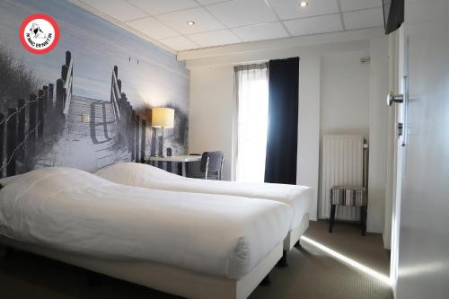 Ένα ή περισσότερα κρεβάτια σε δωμάτιο στο Heeren van Noortwyck