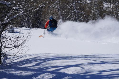 a person is skiing down a snow covered slope at Haus Staud in Schmirn