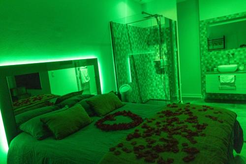 Ένα ή περισσότερα κρεβάτια σε δωμάτιο στο La chambre des secrets
