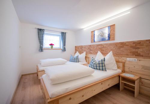 Postel nebo postele na pokoji v ubytování Haus Staud