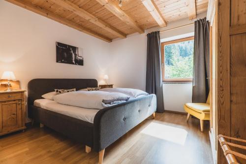 Posteľ alebo postele v izbe v ubytovaní Ferienwohnungen Wiesbauer
