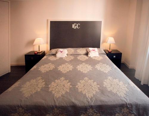 Letto o letti in una camera di Hotel Giulio Cesare