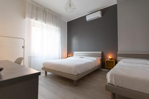 Ένα ή περισσότερα κρεβάτια σε δωμάτιο στο Relax nel Verde