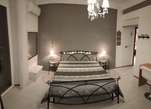 Ліжко або ліжка в номері LA TANA DELLA VOLPE