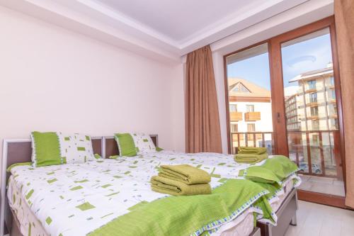 Ένα ή περισσότερα κρεβάτια σε δωμάτιο στο Gudauri Palace apartments in New Gudauri