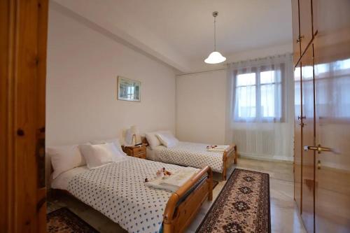 A bed or beds in a room at Relaxing experiences near Ancient Olympia