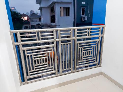 a balcony with a metal railing on a building at Benhill Syariah Residence 2 Mitra RedDoorz in Jakarta