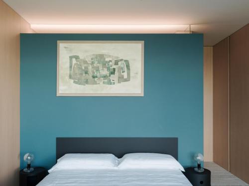 Postel nebo postele na pokoji v ubytování LARIUM BED & BREAKFAST - PIGRA