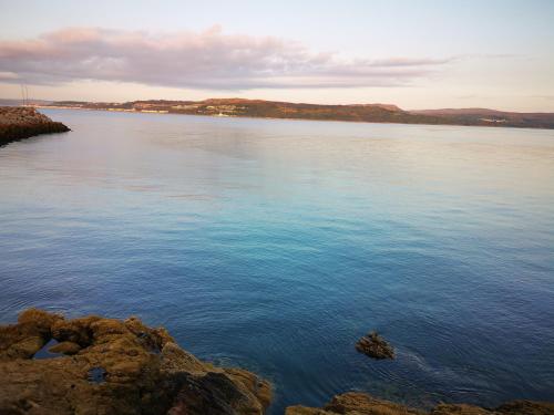 a view of a large body of water at Welcome to St Helena Dunoon, a traditional villa in Dunoon