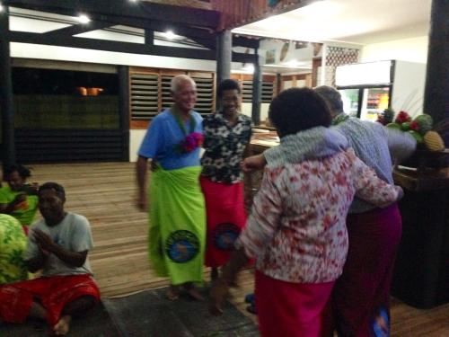 a group of people dancing in a room at Funky Fish Beach & Surf Resort in Malolo