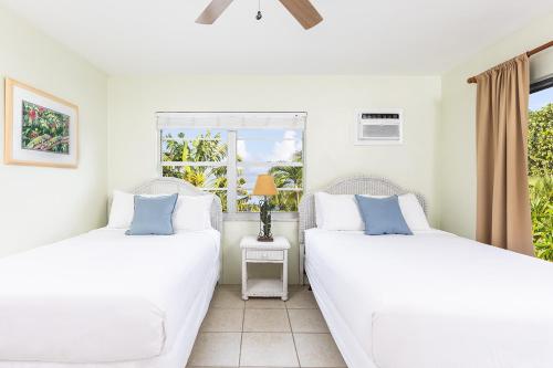 Ліжко або ліжка в номері Gulf View Waterfront Resort