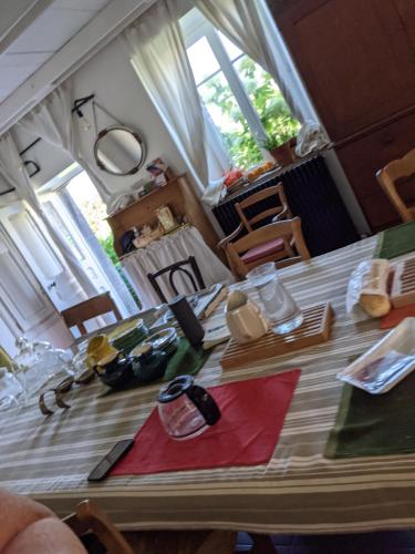 a table with shoes on it in a room at La Grange de Dourlers in Dourlers