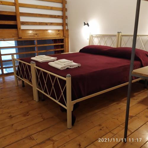 Letto o letti in una camera di Il Castello Apartment