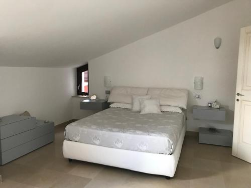 A bed or beds in a room at Maria Ancona suite