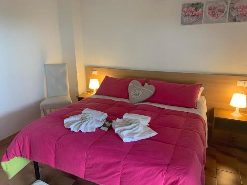 Ein Bett oder Betten in einem Zimmer der Unterkunft Hotel Miramonti Seulo Turismo Rurale