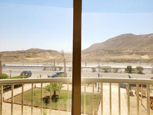 a view of a desert from a balcony at Oasis marsa alam in Marsa Alam City