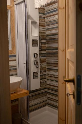 a bathroom with a sink and a shower at B&B Sud e Magia in Castelmezzano