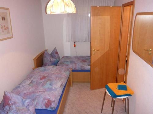 Postel nebo postele na pokoji v ubytování Ferienwohnung-Rita