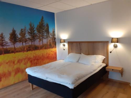 Postel nebo postele na pokoji v ubytování Hotell Greven