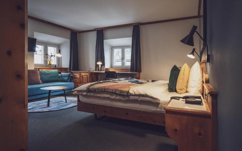 Postel nebo postele na pokoji v ubytování Hotel Davoserhof by Mountain Hotels