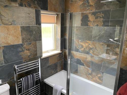 Koupelna v ubytování Granite Cottage