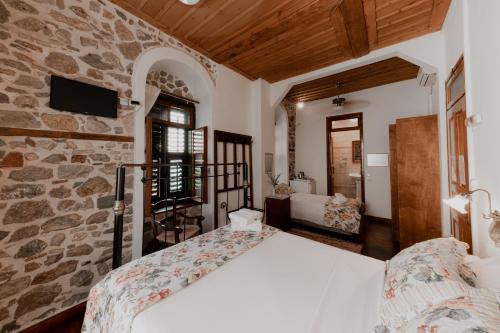 Postel nebo postele na pokoji v ubytování Rigas Pension Nafplio