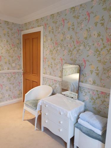 Postel nebo postele na pokoji v ubytování Lynster House