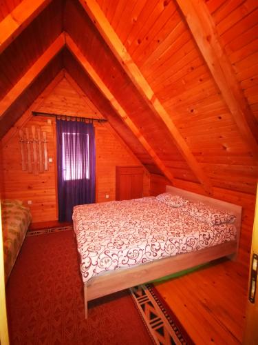 Giường trong phòng chung tại Holiday Home Snow Queen