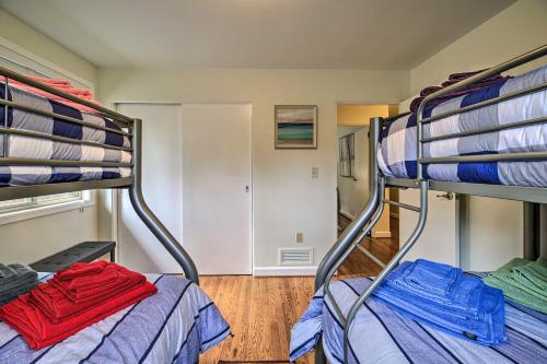 a room with two bunk beds and a hallway at Updated Ranch-Style Home with Scenic Deck, Pond in Kingsport