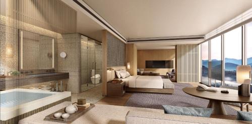 una camera d'albergo con letto e vasca di Crowne Plaza Zunhua Hot Spring Town, an IHG Hotel a Zunhua
