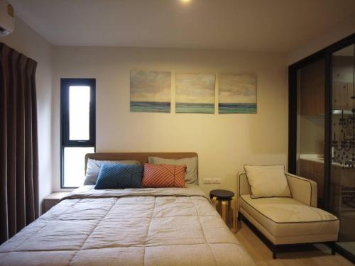 Postel nebo postele na pokoji v ubytování La Casita Hua Hin by Holiyay