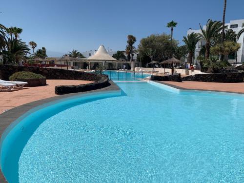 Bazén v ubytování Luxury Sea Apartment Lanzarote PaLù Holiday House nebo v jeho okolí
