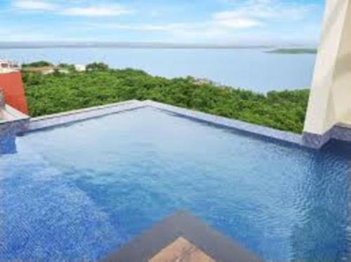 Piscina di Tata Housing Rio De Goa o nelle vicinanze