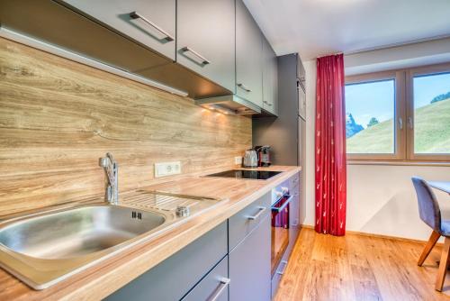 Kuchyň nebo kuchyňský kout v ubytování HUS23 with Wellness